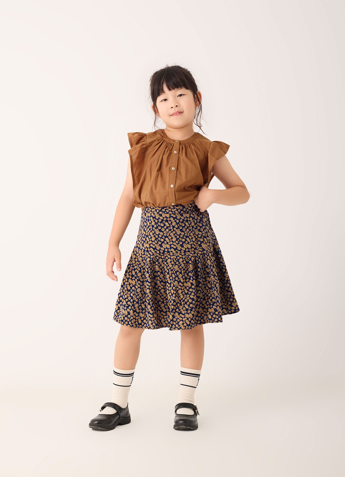 Peacoat by Printed Skirt