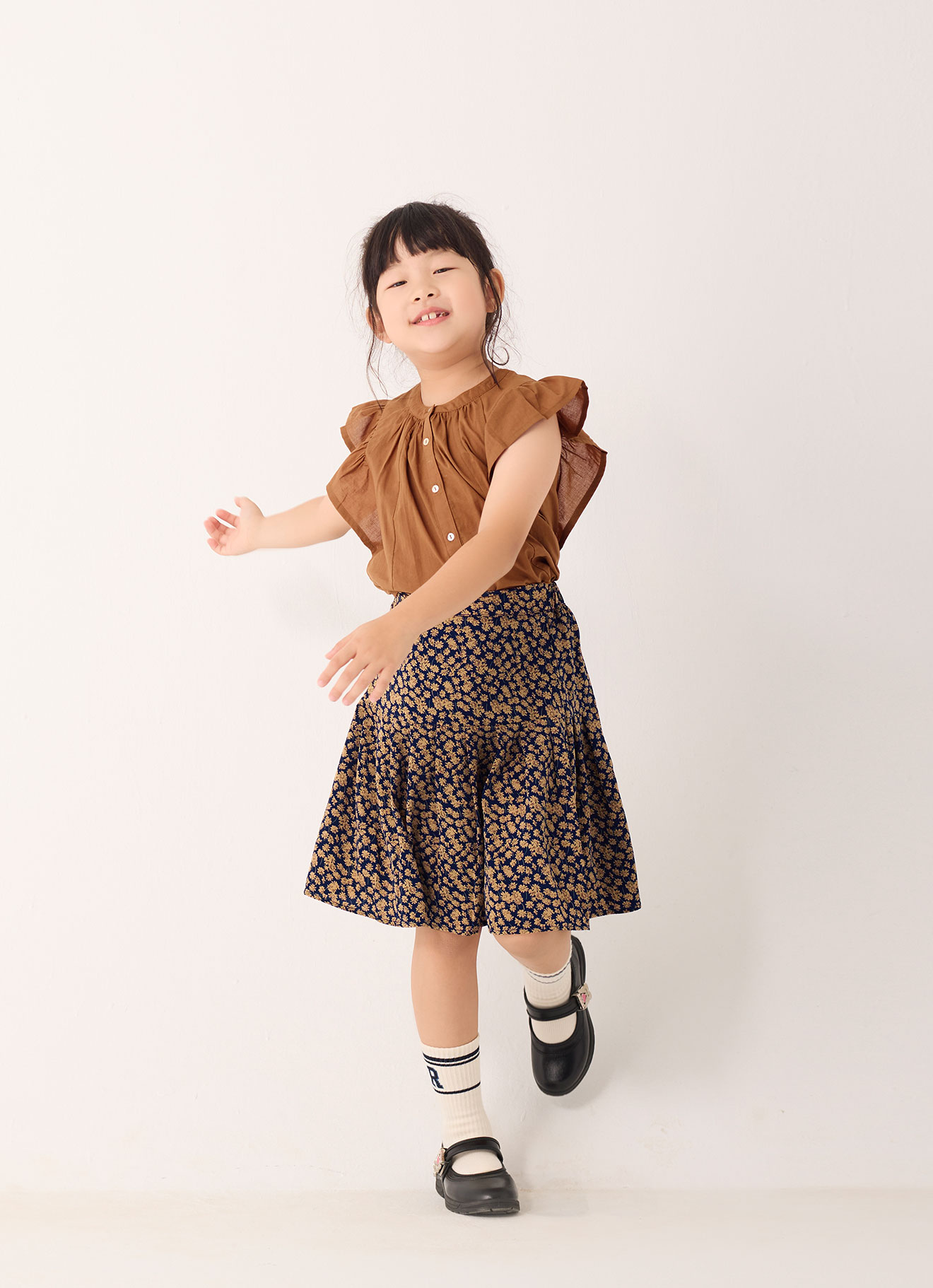 Peacoat by Printed Skirt