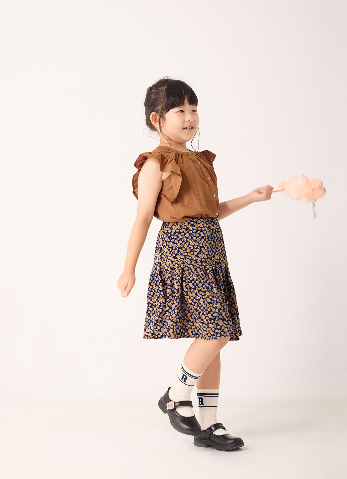 Peacoat by Printed Skirt